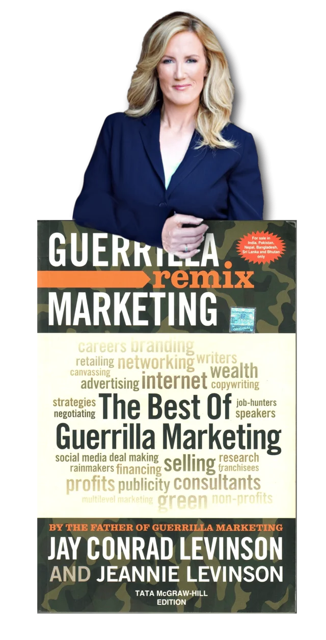 Wendy Stevens holding The Best of Guerrilla Marketing book